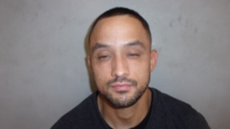 Man arrested after barricading himself in home